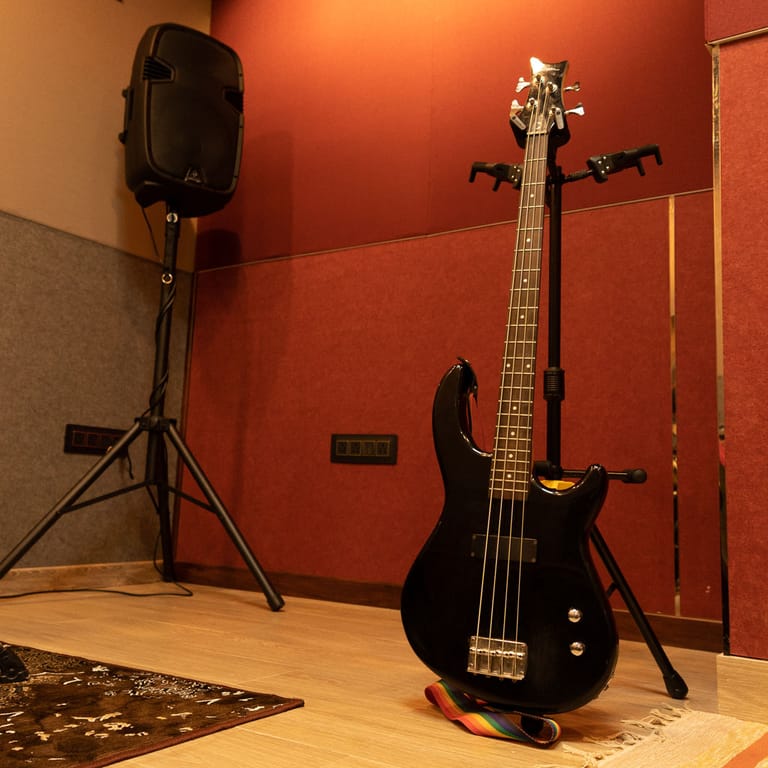 Bass guitar on a stand in the music room