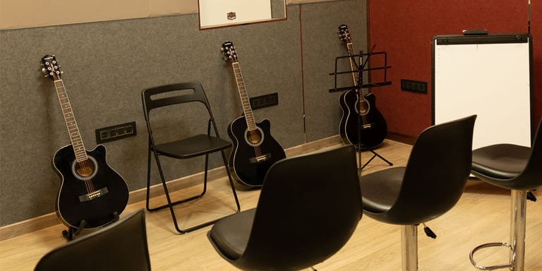 Microphone set up in front of the drum kit